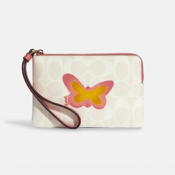 Coach Handbags - Coach Signature Canvas Wristlet with Butterfly Accent